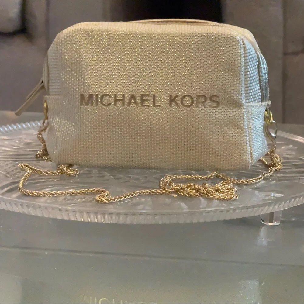 Michael Kors Shimmering Cream Gold Pouch with golden sling